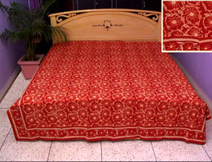 Saffron-red colored bed sheet