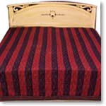 Plant shaped designs on maroon- black bed sheet