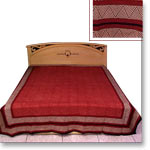 Brick red colored bed sheet